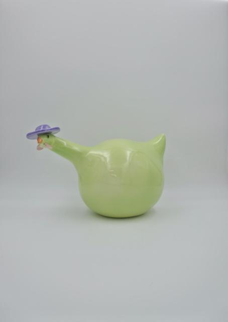Catherine Hunter Longchamp groene hen met hoed
