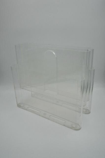 Doorzichtige tijdschriftenhouder, ontworpen door Giotto Stoppino voor Kartell